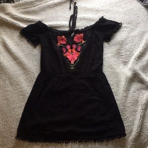 Black dress, bright Orange and pink chest